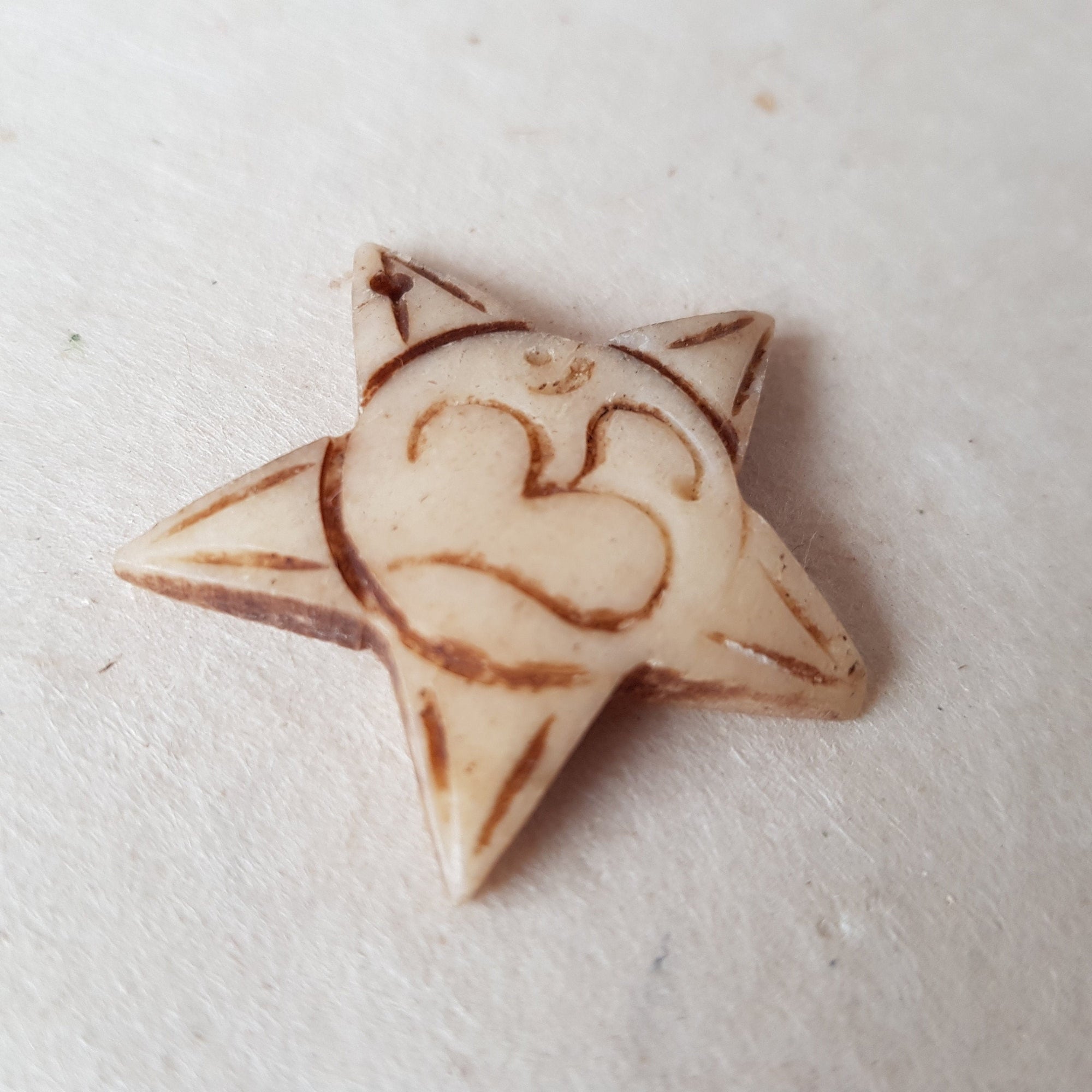 Om and Star shaped Bone Pendant